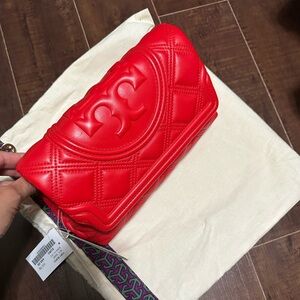 Red Tory Burch clutch bag
